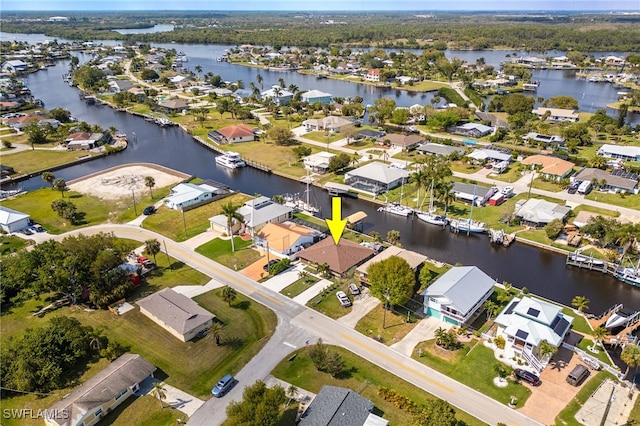 aerial view featuring a residential view and a water view