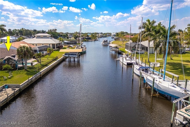 view of dock featuring a residential view, a water view, and boat lift