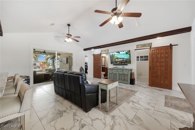 living room featuring marble finish floor, visible vents, a barn door, a ceiling fan, and vaulted ceiling