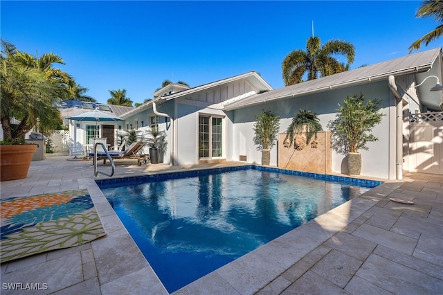 pool with a patio