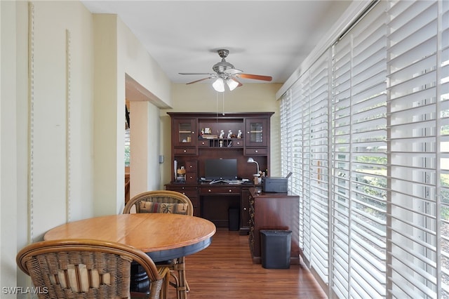 interior space with ceiling fan and wood finished floors