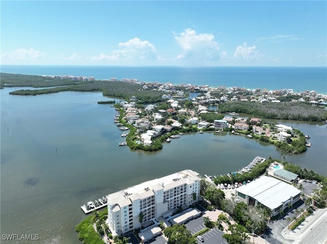 bird's eye view with a water view