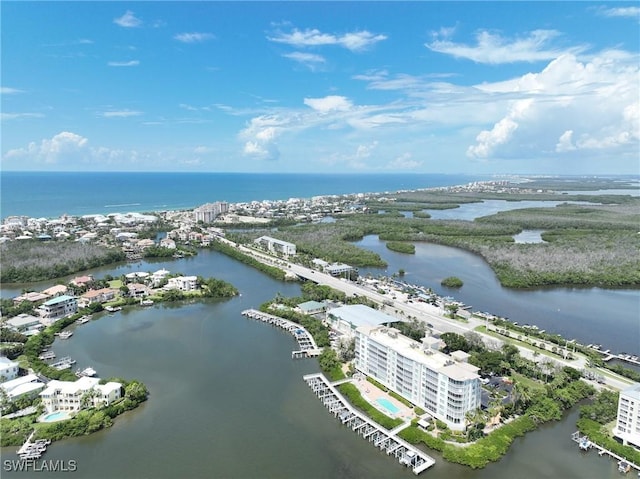 birds eye view of property featuring a water view
