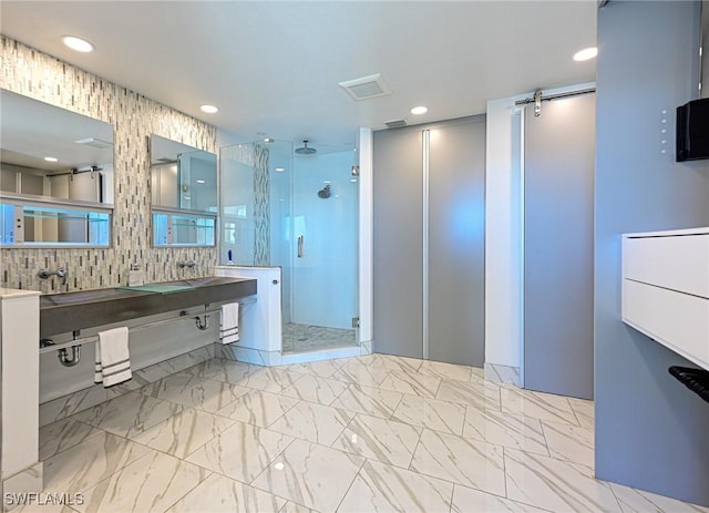 full bathroom featuring recessed lighting, a shower stall, backsplash, marble finish floor, and double vanity