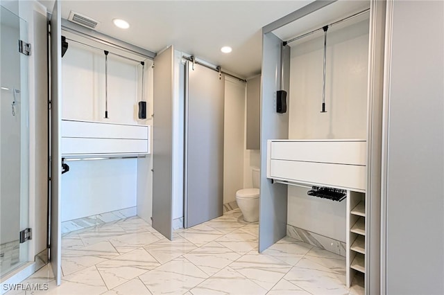 bathroom featuring marble finish floor, recessed lighting, toilet, and visible vents