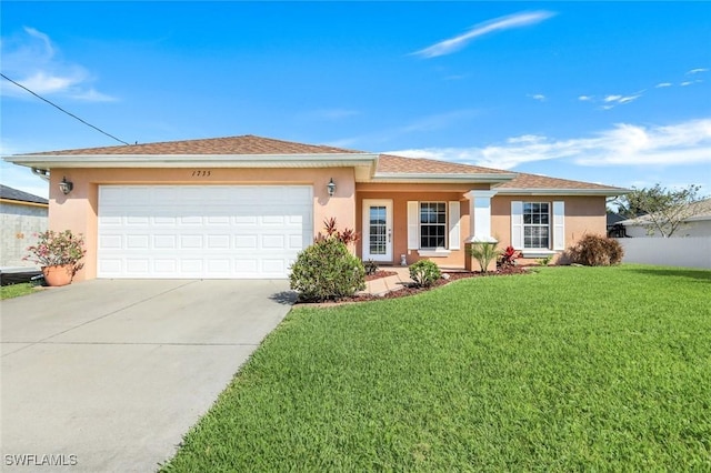 view of front of property with driveway, a front yard, and stucco siding