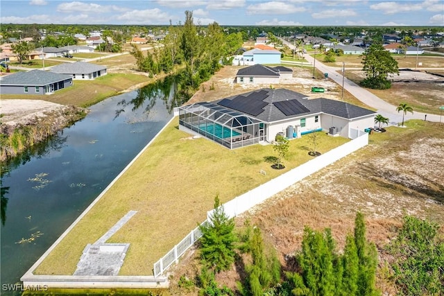 aerial view featuring a residential view and a water view