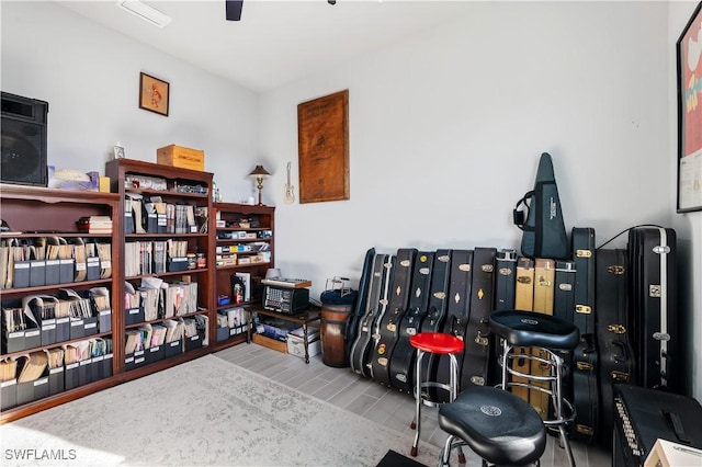 interior space with visible vents and wood finished floors