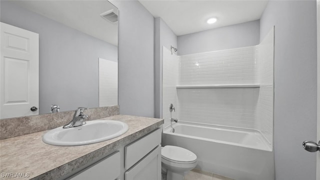 bathroom featuring toilet, visible vents, tub / shower combination, and vanity