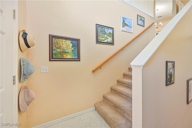 stairs with tile patterned flooring and baseboards