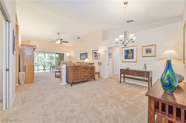 interior space featuring light carpet, ceiling fan with notable chandelier, visible vents, vaulted ceiling, and hanging light fixtures