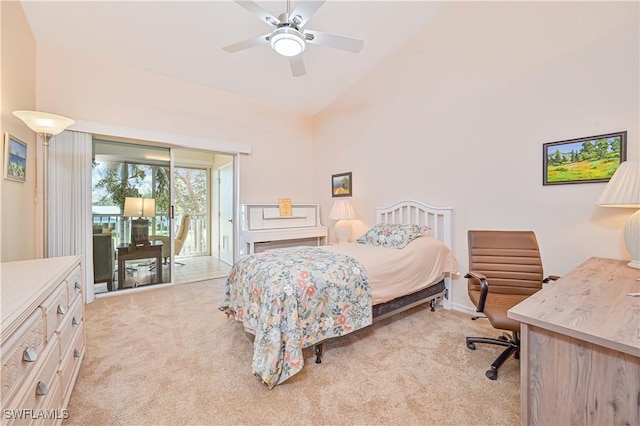 bedroom with access to exterior, light colored carpet, vaulted ceiling, and a ceiling fan