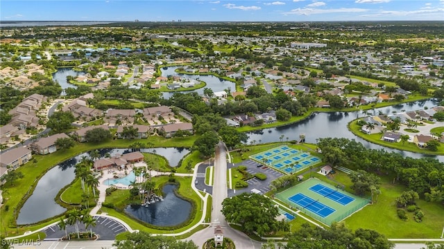 bird's eye view with a water view and a residential view