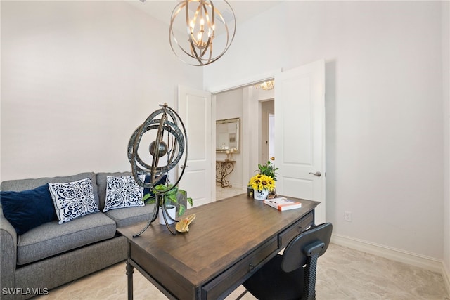 office space with baseboards and a notable chandelier