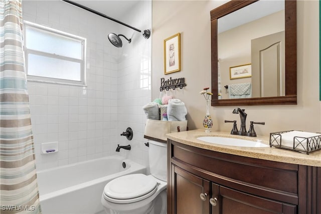 bathroom with vanity, toilet, and shower / tub combo with curtain