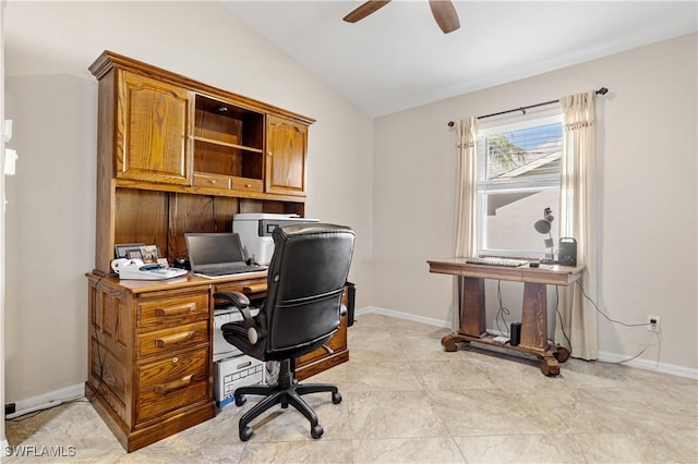 office space featuring ceiling fan, baseboards, and vaulted ceiling