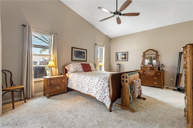 bedroom featuring high vaulted ceiling, light colored carpet, ceiling fan, and baseboards