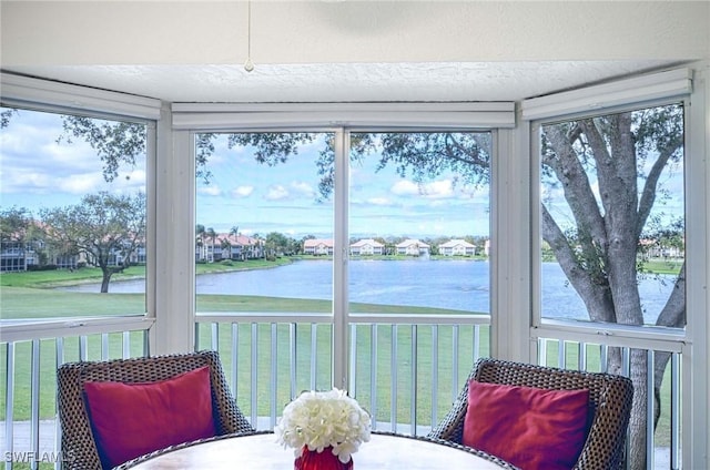 28068 Cavendish Ct Unit 2308, Bonita Springs, FL 34135 - sunroom / solarium featuring a water view and plenty of natural light