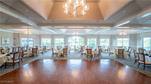 28068 Cavendish Ct Unit 2308, Bonita Springs, FL 34135 - dining area featuring a chandelier, ornamental molding, plenty of natural light, wood finished floors, and coffered ceiling