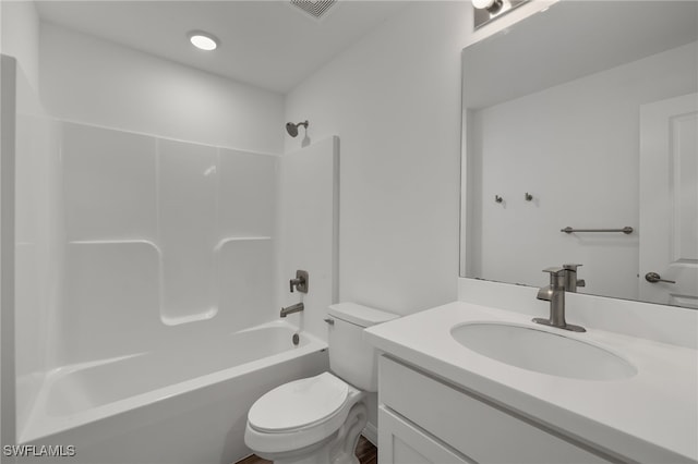 bathroom with visible vents, vanity, toilet, and shower / bathtub combination