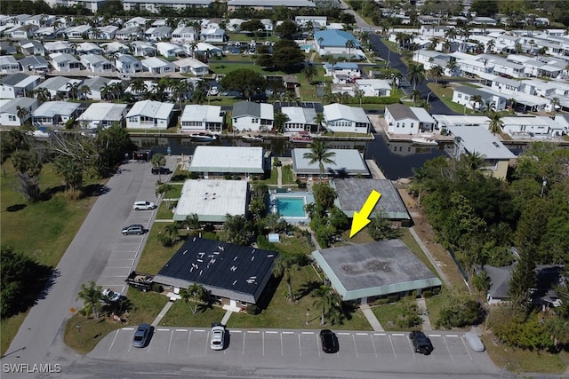 birds eye view of property with a residential view