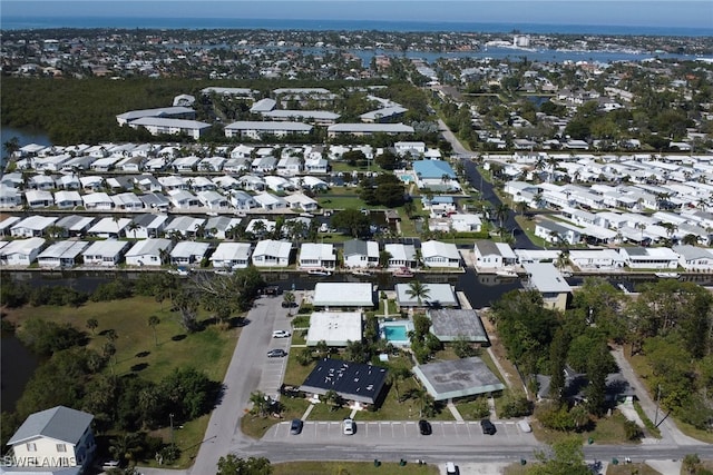 birds eye view of property with a residential view