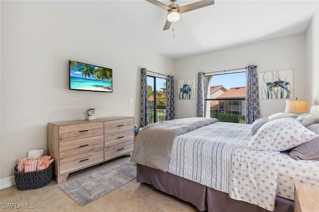 bedroom with light tile patterned floors, baseboards, a ceiling fan, and access to exterior