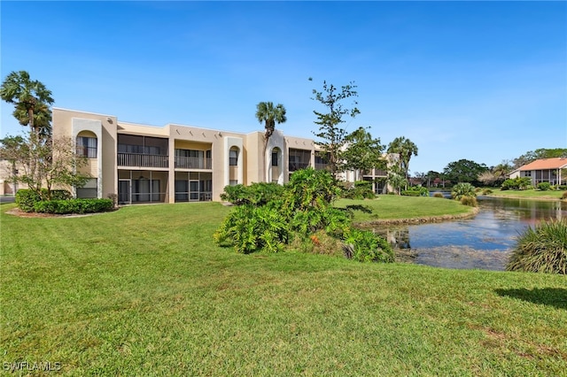 view of building exterior featuring a water view