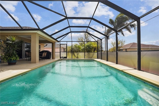 view of pool featuring a fenced in pool, a lanai, and a patio