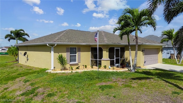 ranch-style house with roof with shingles, stucco siding, a garage, driveway, and a front lawn