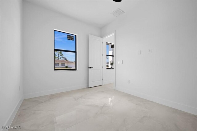 349 Rancho Ave, Lehigh Acres, FL 33974 - empty room featuring visible vents and baseboards