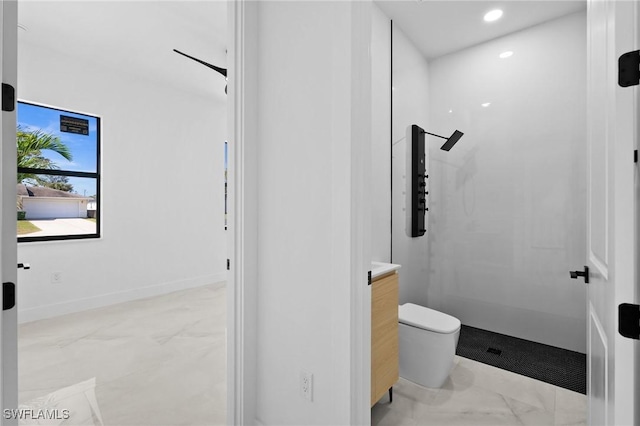 349 Rancho Ave, Lehigh Acres, FL 33974 - bathroom with recessed lighting, toilet, a shower stall, vanity, and baseboards