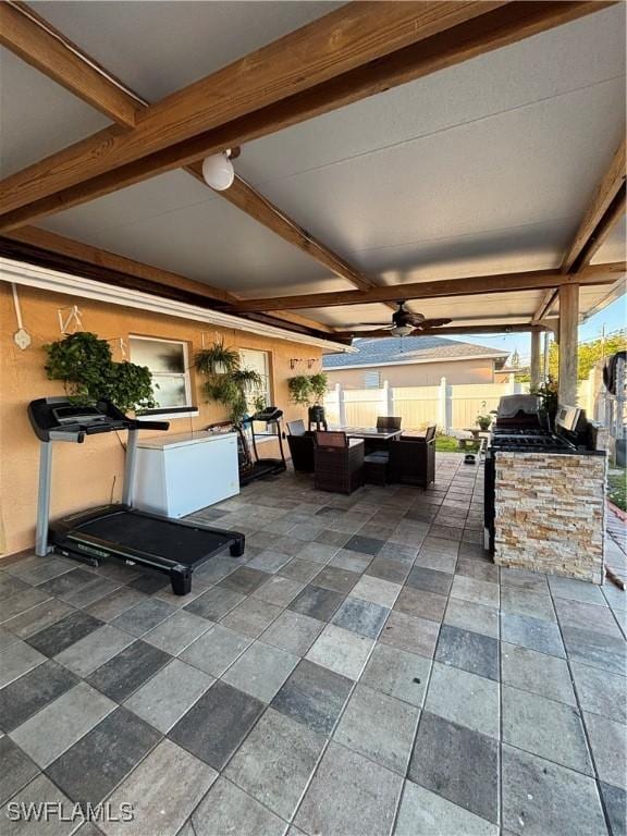 view of patio / terrace featuring outdoor lounge area and fence