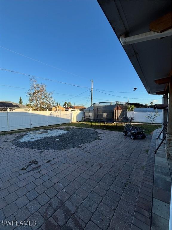 exterior space featuring a fenced backyard