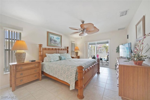 bedroom featuring ceiling fan, light tile patterned floors, visible vents, and access to exterior