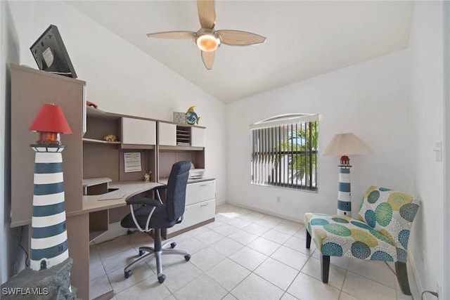 home office featuring lofted ceiling, light tile patterned flooring, ceiling fan, and baseboards