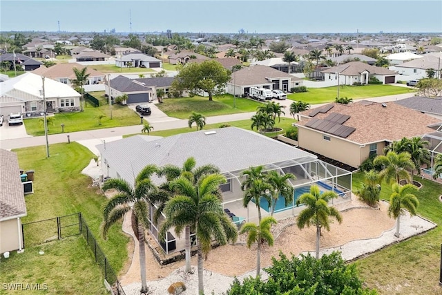 birds eye view of property with a residential view