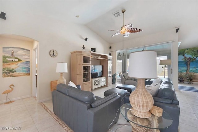 living room featuring vaulted ceiling, visible vents, a ceiling fan, and tile patterned floors