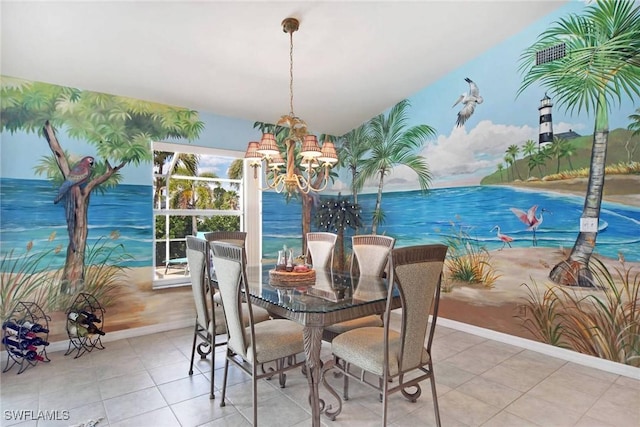 tiled dining area featuring wallpapered walls, baseboards, and a notable chandelier