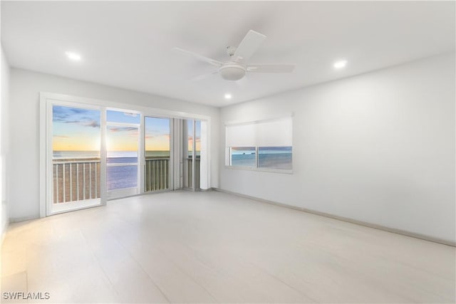 unfurnished room featuring ceiling fan and recessed lighting