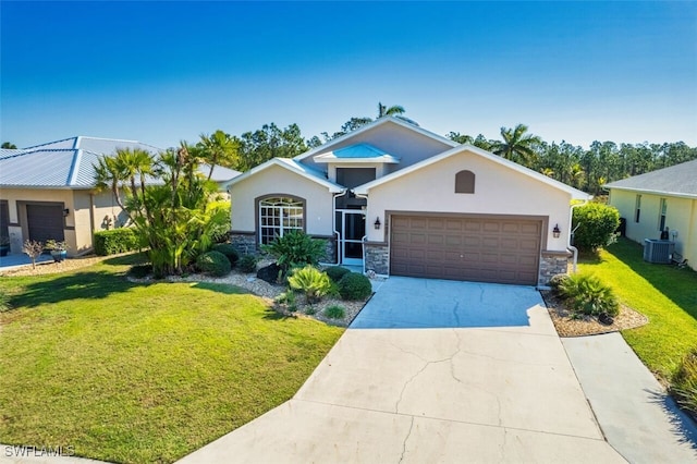 view of front of house featuring an attached garage, stone siding, driveway, stucco siding, and a front yard