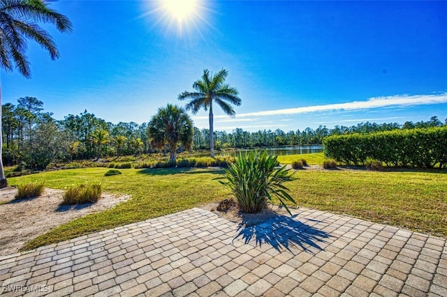 view of patio / terrace featuring a water view