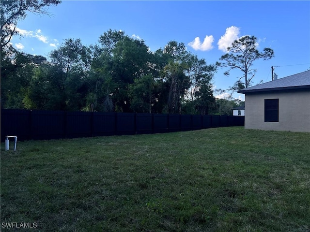 view of yard featuring fence