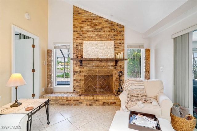 tiled living area with lofted ceiling, plenty of natural light, and a fireplace