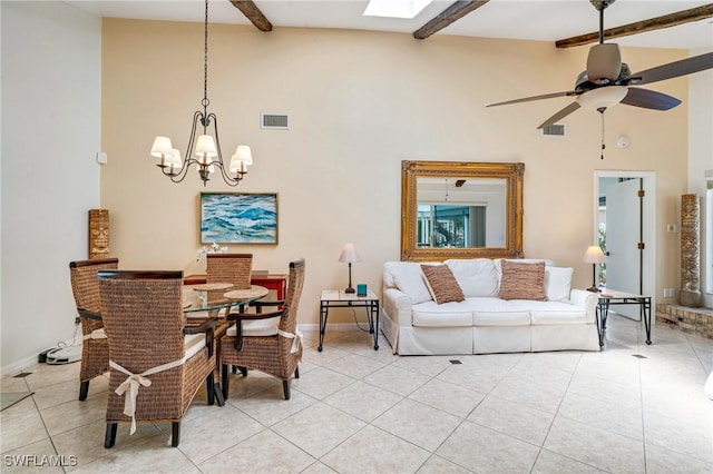 dining space featuring light tile patterned floors, beam ceiling, visible vents, and baseboards