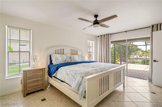 bedroom featuring access to exterior, baseboards, a ceiling fan, and light tile patterned flooring