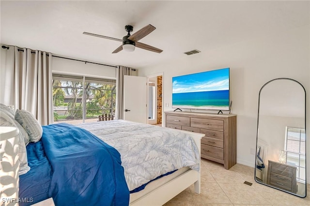 bedroom featuring a ceiling fan, access to outside, visible vents, and light tile patterned floors