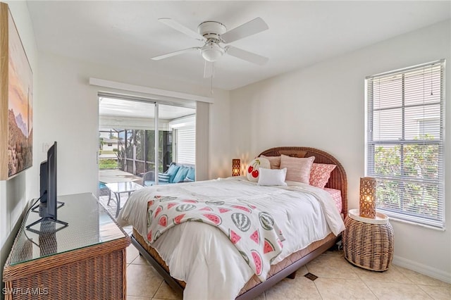 bedroom with ceiling fan, access to outside, tile patterned flooring, and baseboards