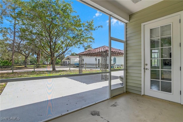 view of unfurnished sunroom