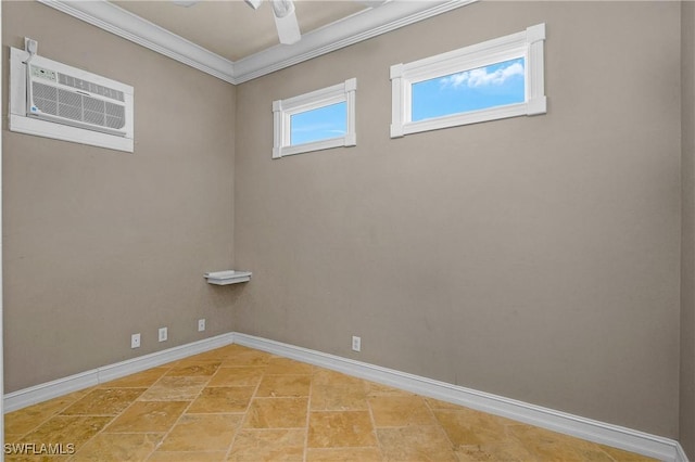 empty room with ceiling fan, ornamental molding, a wall mounted air conditioner, and baseboards